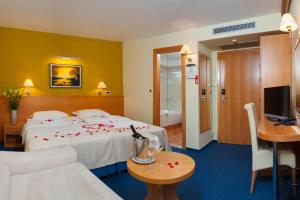 Letto o letti in una camera di Hotel Saudade
