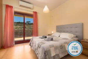 Säng eller sängar i ett rum på Villa 14 Marina de Albufeira