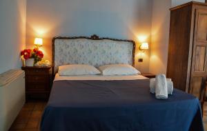 Postel nebo postele na pokoji v ubytování Velia Mare + 24 fotografií