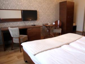 Postel nebo postele na pokoji v ubytování Motel Zacisze