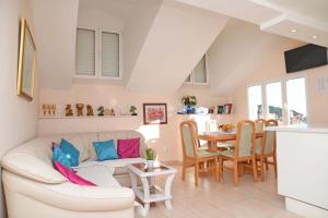 Et opholdsområde på Holiday Home Mila