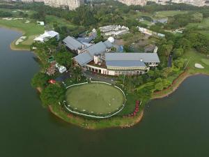 an aerial view of a house on an island in the water at Shenzhen Universide-Senter＆BaoHe Road Kyriad Marvelous Hotel in Shenzhen