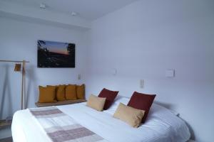 Voodi või voodid majutusasutuse Well-situated and Comfortable Home toas