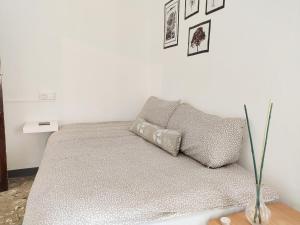 Postel nebo postele na pokoji v ubytování Casa Nadal