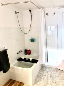 a bathroom with a shower and a sink at Casa Nadal in Concud