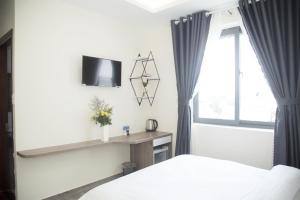 TV a/nebo společenská místnost v ubytování Pontus Hotel