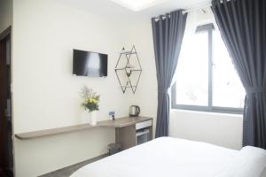 מיטה או מיטות בחדר ב-Pontus Hotel