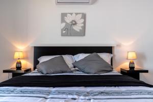 Voodi või voodid majutusasutuse Roraima House - Private Pool & Garden toas