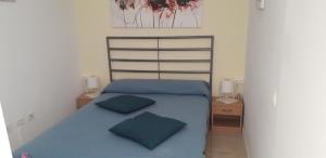 A bed or beds in a room at Sweet House