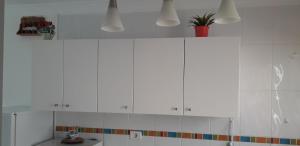 A kitchen or kitchenette at Sweet House