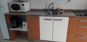 A kitchen or kitchenette at Sweet House