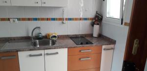 A kitchen or kitchenette at Sweet House