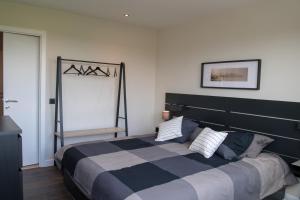 Postel nebo postele na pokoji v ubytování Cocoon in East-Brussels