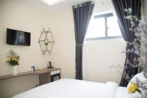 TV a/nebo společenská místnost v ubytování Pontus Hotel + 18 fotografií