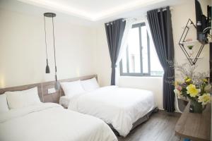 Postel nebo postele na pokoji v ubytování Pontus Hotel