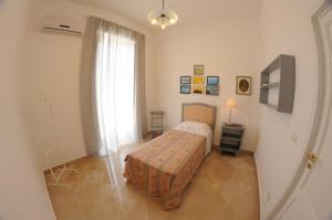 Postel nebo postele na pokoji v ubytování B&B Liberty