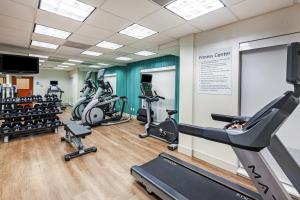 a gym with several treadmills and cardio equipment at Holiday Inn Express New Orleans East, an IHG Hotel in New Orleans
