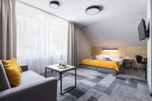 Postel nebo postele na pokoji v ubytování KRISTINA Willa & Spa + 37 fotografií