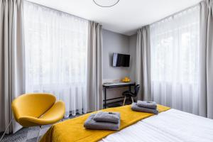 Posteľ alebo postele v izbe v ubytovaní KRISTINA Willa & Spa