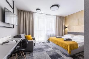 Posteľ alebo postele v izbe v ubytovaní KRISTINA Willa & Spa