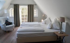 Postel nebo postele na pokoji v ubytování Hotel Alster Au