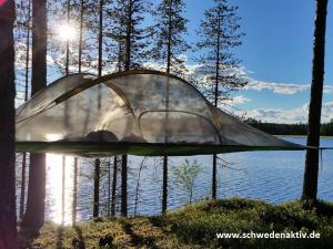 Galeriebild der Unterkunft Baumzelte direkt am See gelegen in Nornäs