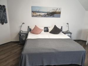 Postel nebo postele na pokoji v ubytování Hotel Blischke