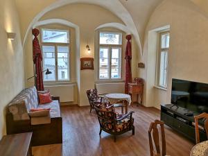 TV a/nebo společenská místnost v ubytování Apartmány na Trojmezí, byt Florián