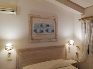 Postel nebo postele na pokoji v ubytování Hotel Tabby