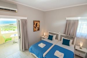 Postel nebo postele na pokoji v ubytování Katerina Hotel + 37 fotografií