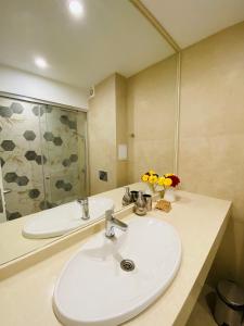 A bathroom at Friends Family Hotel