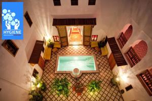 an overhead view of a building with a swimming pool at Riad Zineb in Marrakesh