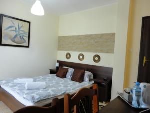 Łóżko lub łóżka w pokoju w obiekcie GRAND VILLA USTKA- Marmonoli