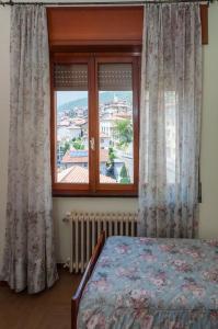 Una cama o camas en una habitación de Albergo De Jean