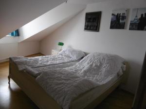 Łóżko lub łóżka w pokoju w obiekcie Appartements Donaublick