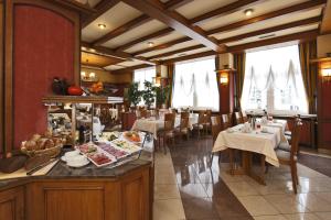 מסעדה או מקום אחר לאכול בו ב-Concorde Hotel Siegen