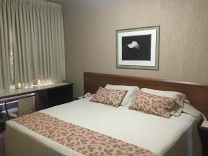 Postel nebo postele na pokoji v ubytování Hotel Santa Fé