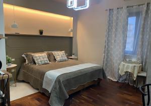 Posteľ alebo postele v izbe v ubytovaní B&B Villa del Sole Relais