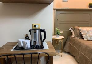 Príslušenstvo na prípravu kávy alebo čaju v ubytovaní B&B Villa del Sole Relais