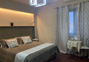 Posteľ alebo postele v izbe v ubytovaní B&B Villa del Sole Relais