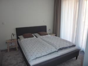 Posteľ alebo postele v izbe v ubytovaní Apartmán 18 - Jestřáb