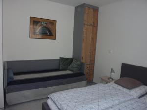 Posteľ alebo postele v izbe v ubytovaní Apartmán 18 - Jestřáb