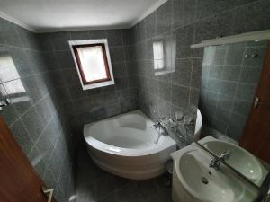 Baðherbergi á Appartements Amrusch