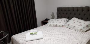 Ein Bett oder Betten in einem Zimmer der Unterkunft Hotel Athenas e Convenções