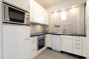 Kuchyň nebo kuchyňský kout v ubytování Representative City Villa
