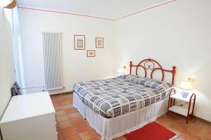 Łóżko lub łóżka w pokoju w obiekcie Villa Capannina