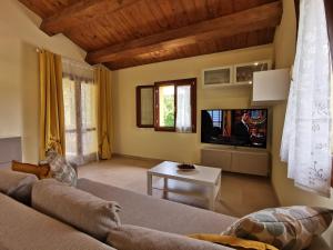 A television and/or entertainment centre at La Casa dell'Orologio
