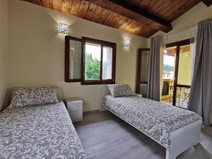 A bed or beds in a room at La Casa dell'Orologio