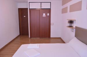 Posteľ alebo postele v izbe v ubytovaní ArArAt Hostel
