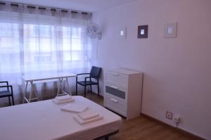 Posteľ alebo postele v izbe v ubytovaní ArArAt Hostel